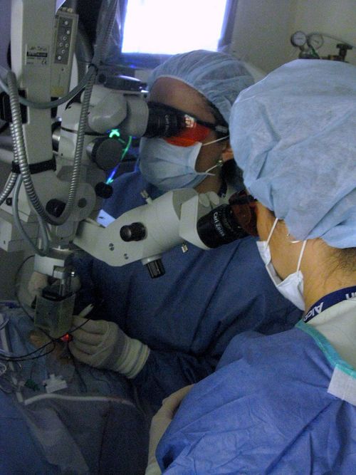 Young woman wearing glasses smiles