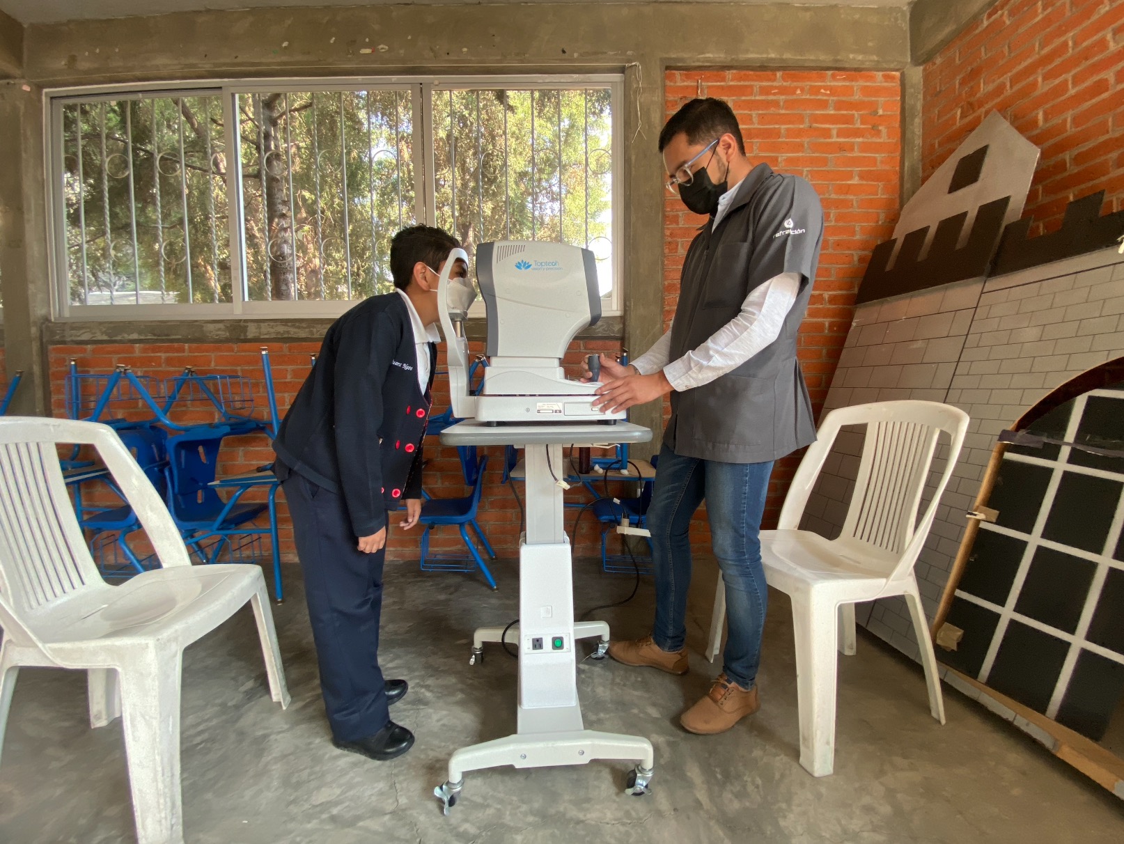 Young woman wearing glasses smiles