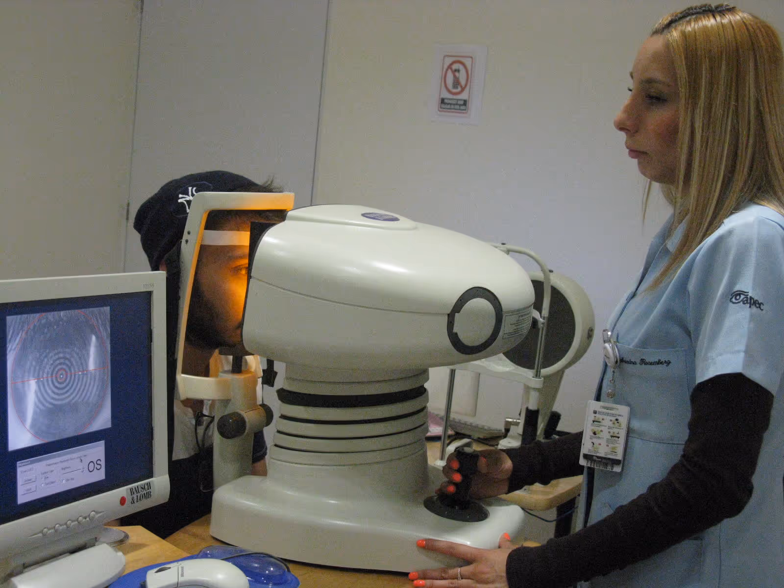Young woman wearing glasses smiles