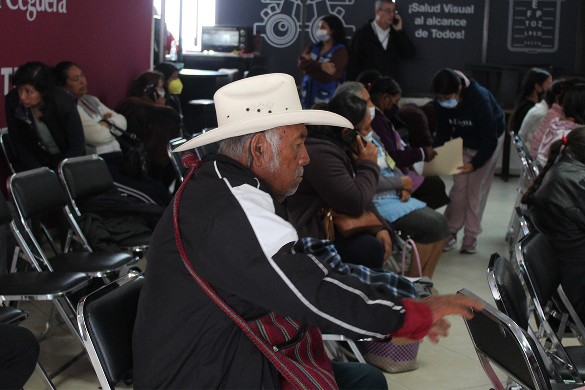 Young woman wearing glasses smiles