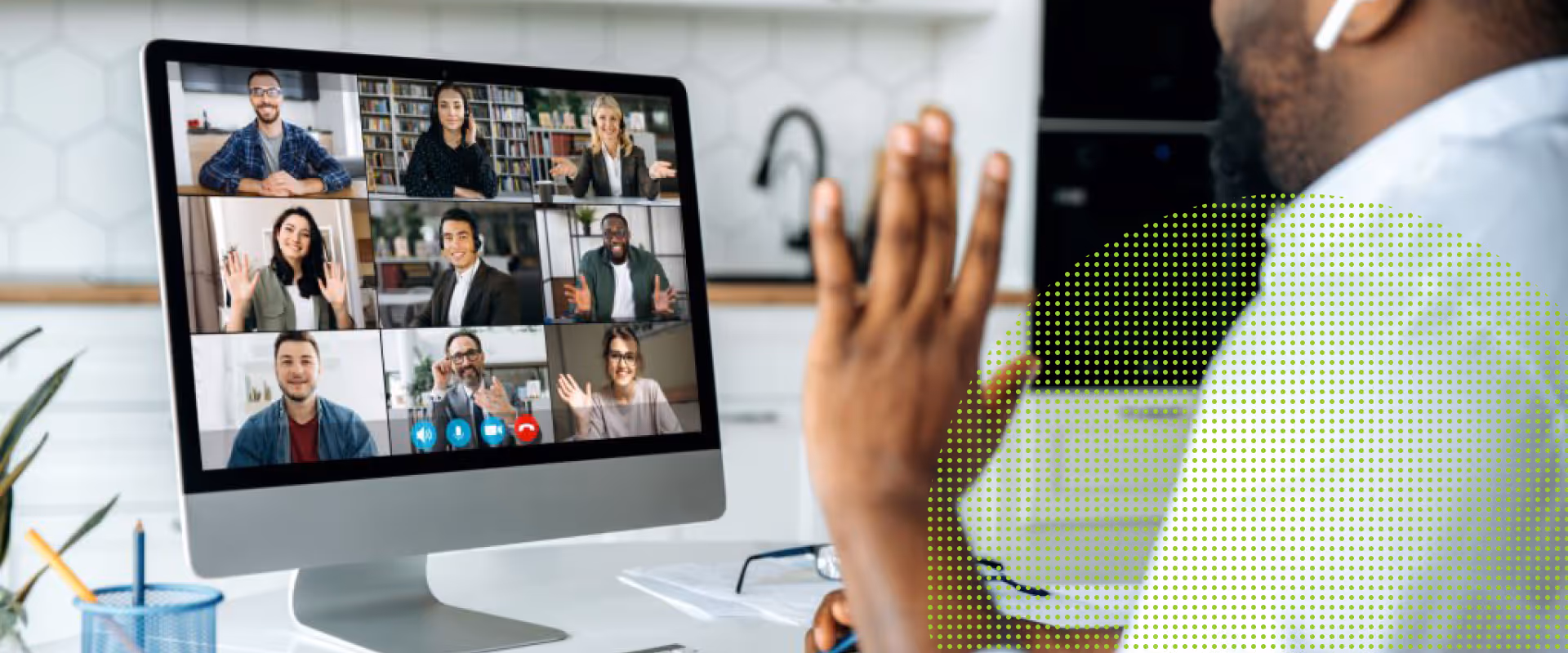 Remote worker greeting team members during a fully visible video conference.
