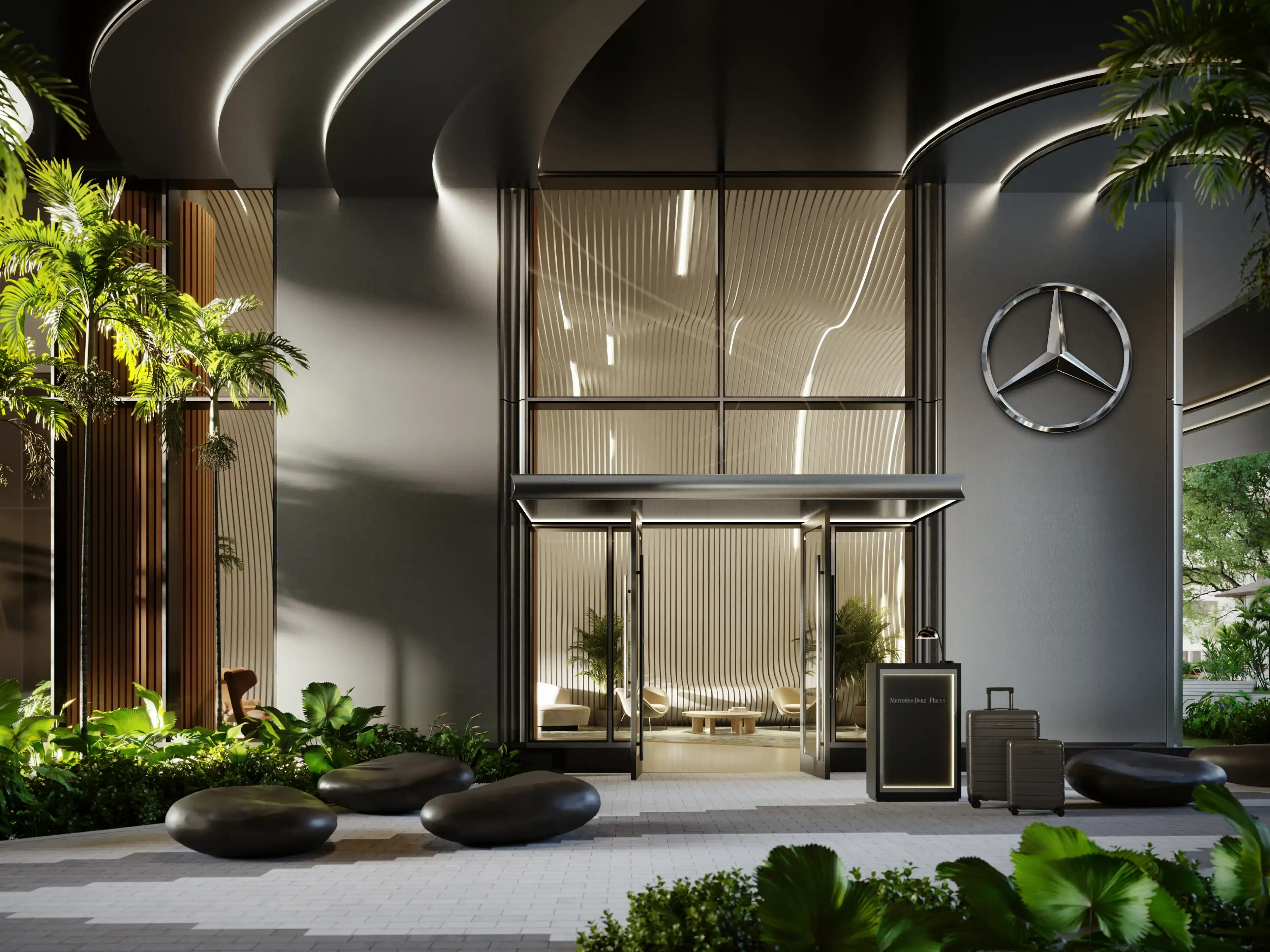 Luxury lobby entrance at Mercedes-Benz Places Miami with sculptural columns and warm ambient lighting