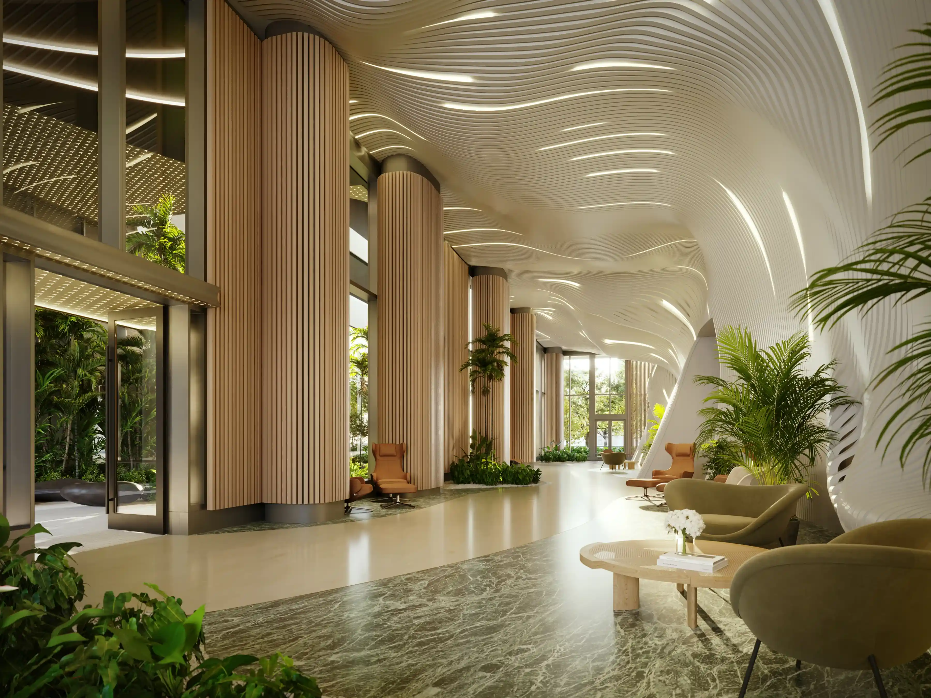 Elegant interior lobby with sculptural columns, indoor landscaping, and natural light.