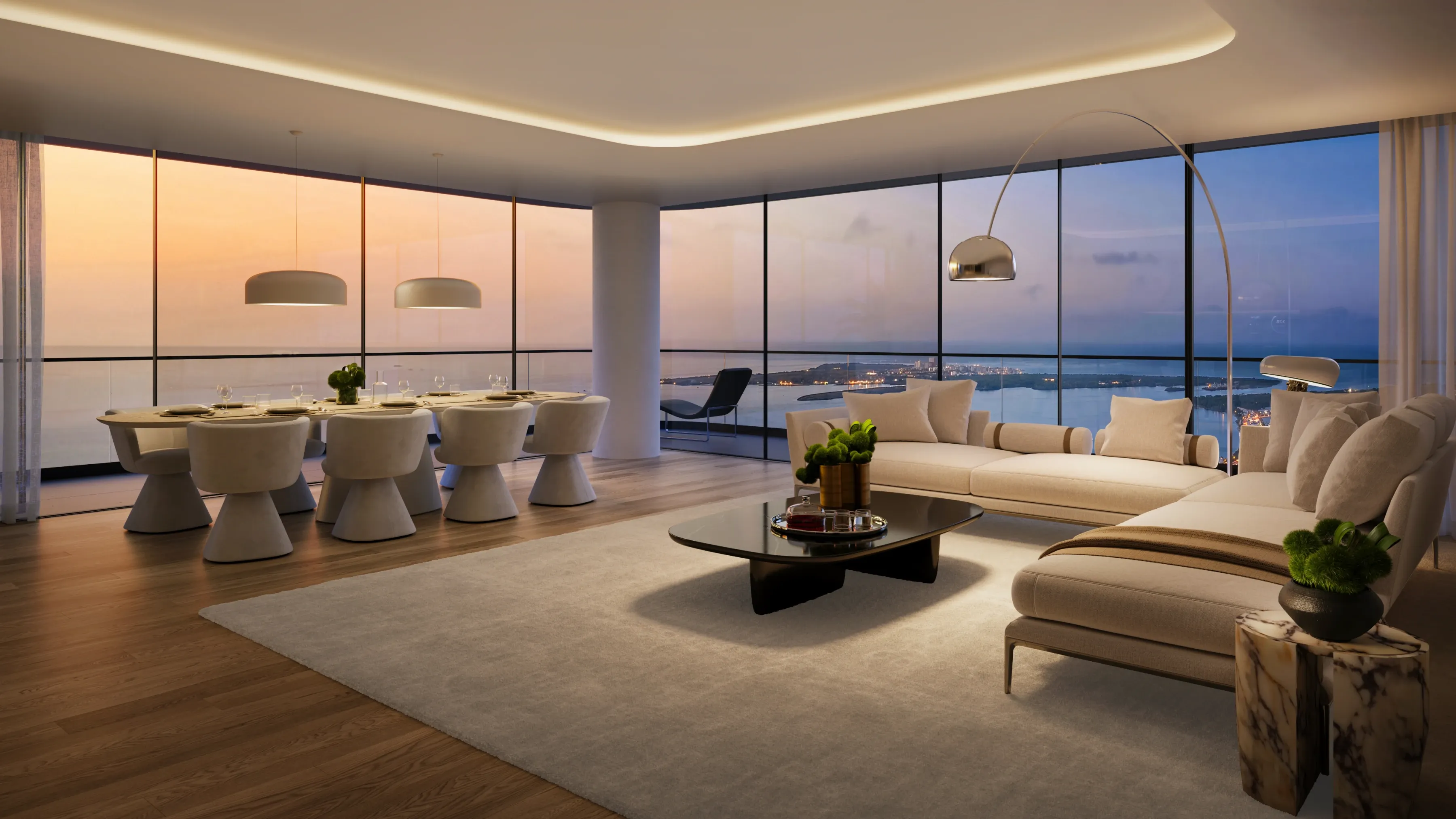 Open-concept living and dining area with neutral décor and ocean-facing windows.