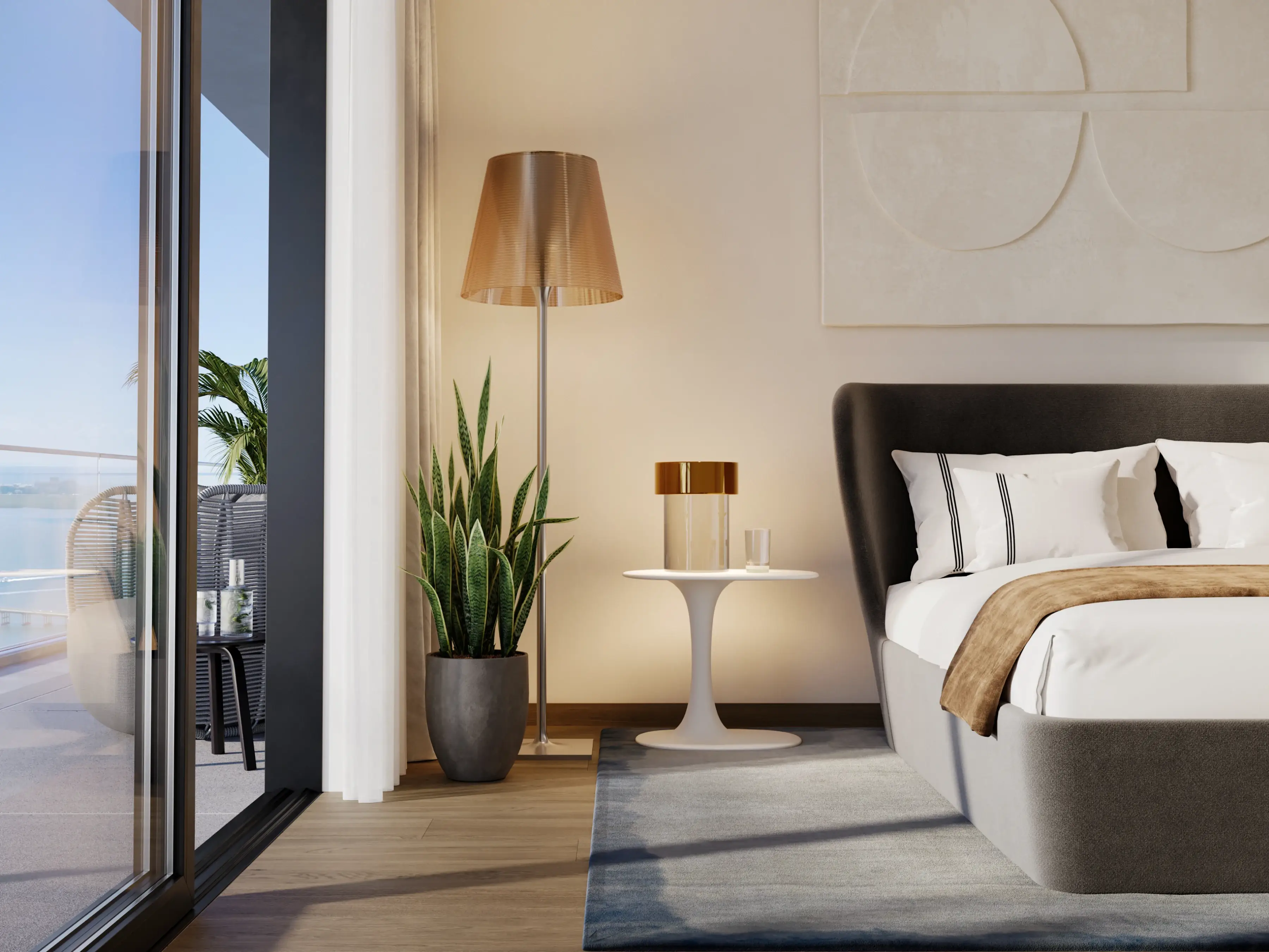 Primary bedroom with warm tones, designer furnishings, and access to terrace views.