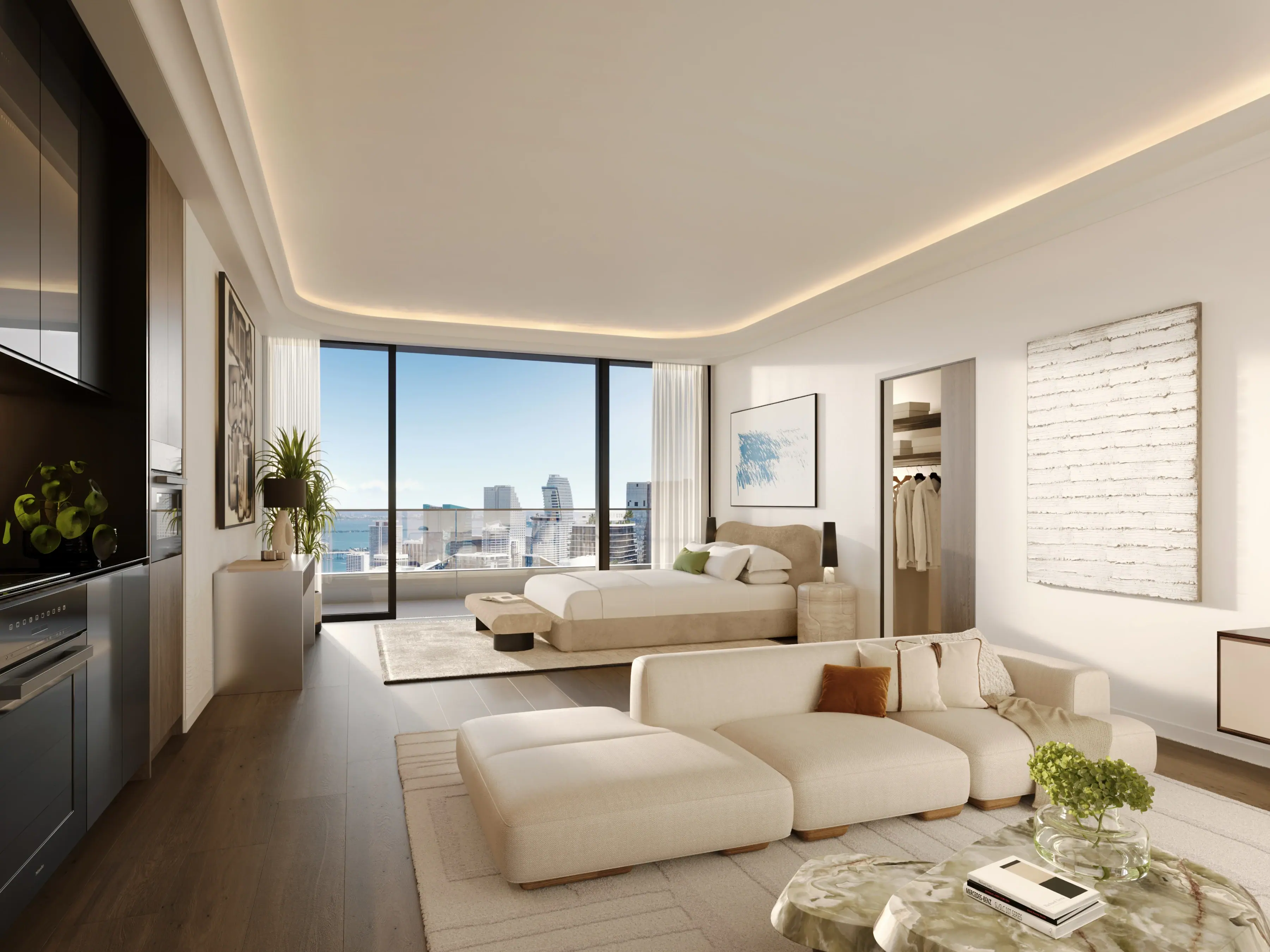 Primary suite with integrated sitting area, soft lighting, and expansive city views.