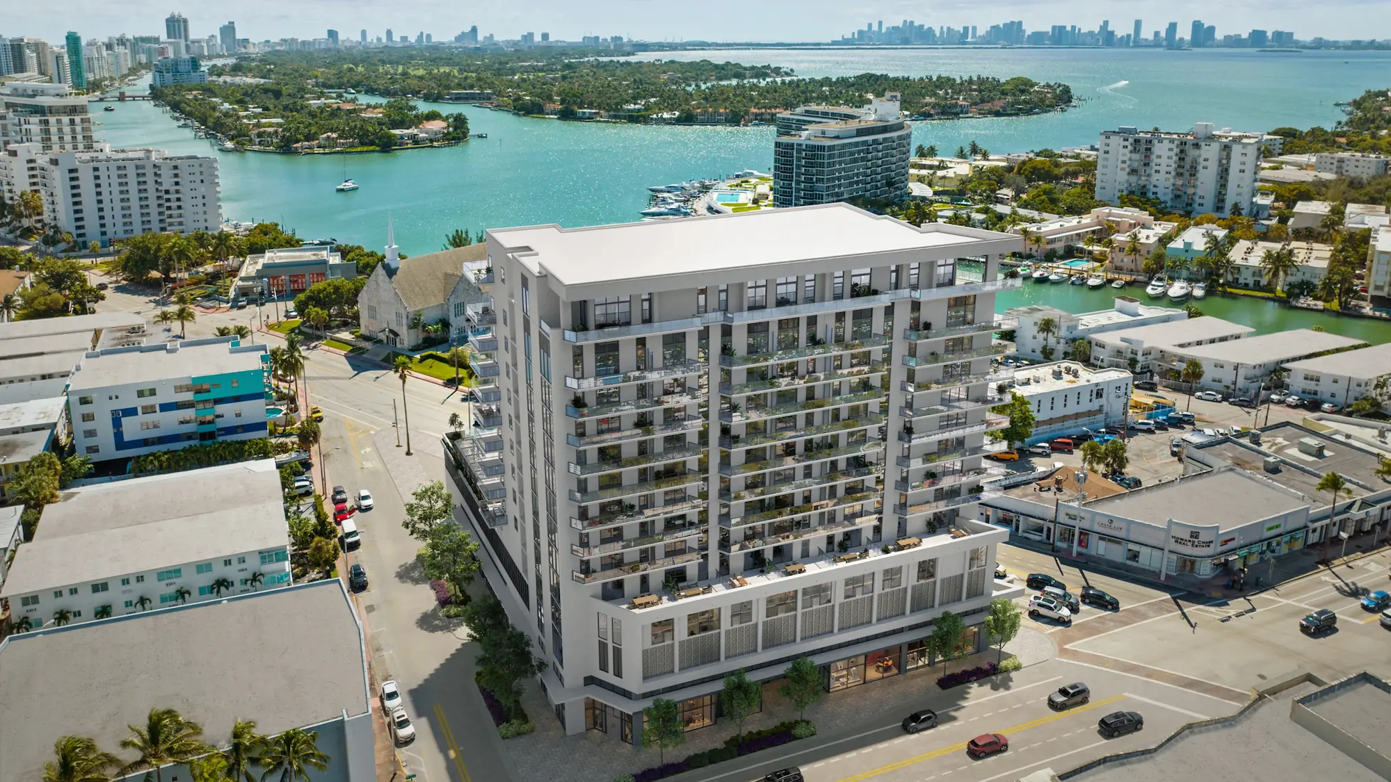 Aerial view of Palma Miami Beach showcasing its prime location between the bay and the city skyline.