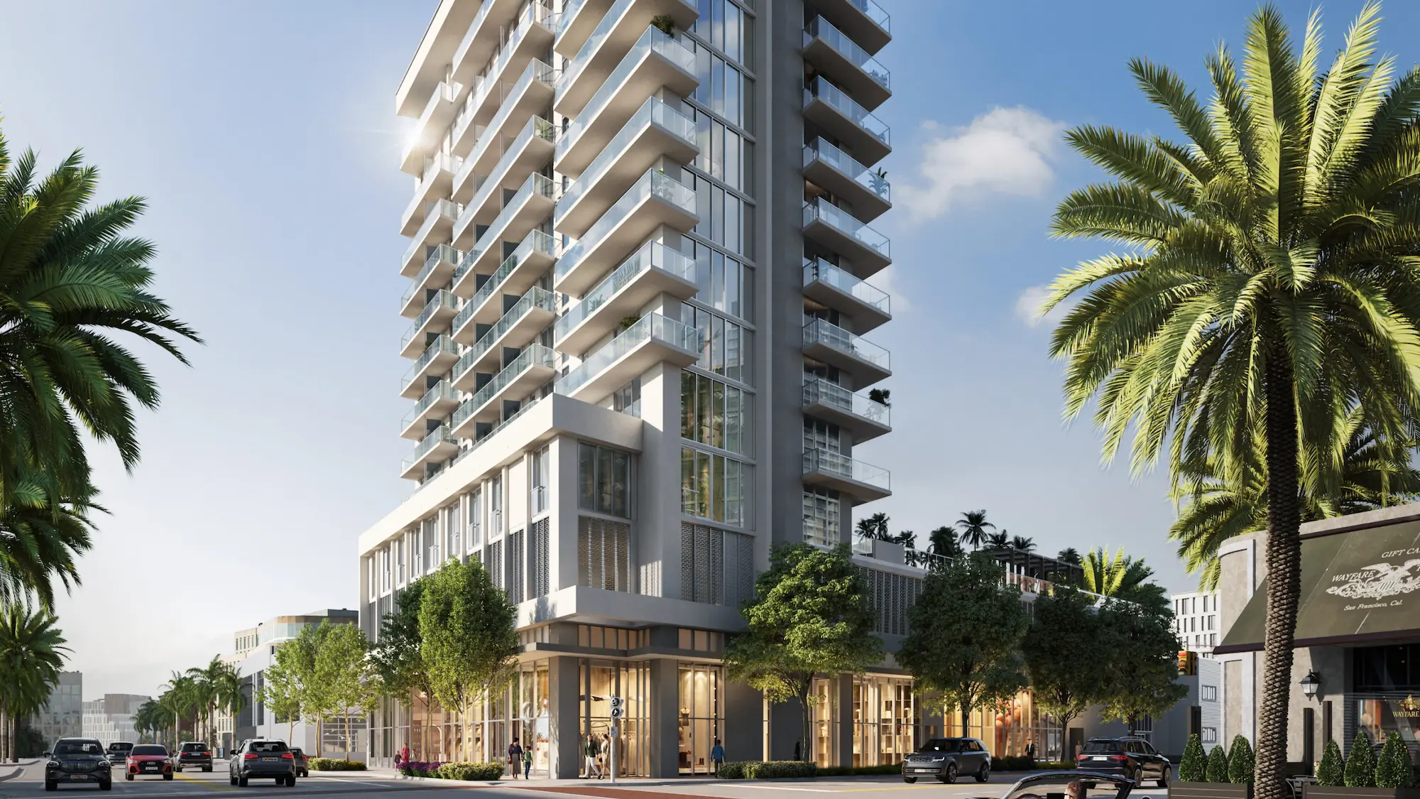 Exterior view of Palma Miami Beach, a modern coastal residential tower surrounded by palm trees.