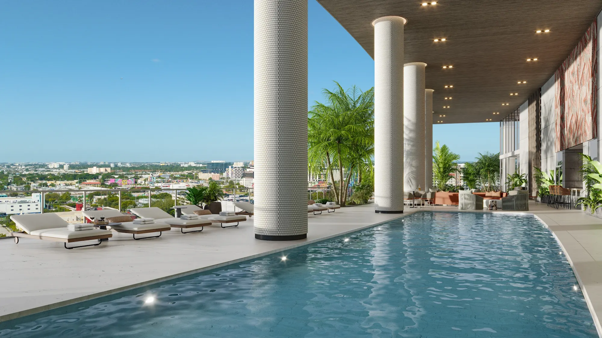 Infinity-edge pool at Edge House Miami with bay views and resort-style deck.