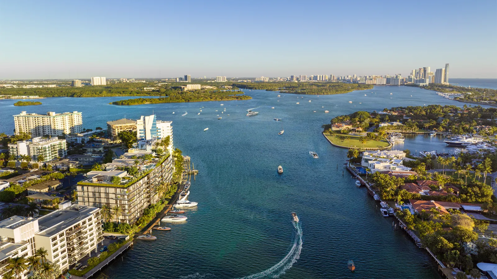 Aerial rendering of Bay Harbor Towers on Biscayne Bay with the building and surrounding water views in Bay Harbor Island, Miami, Florida.