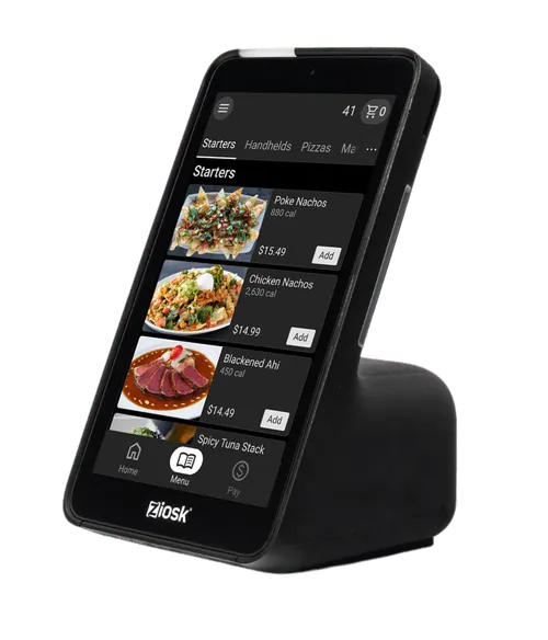 Ziosk restaurant ordering tablet showing a menu with starters including Poke Nachos, Chicken Nachos, Blackened Ahi, and Spicy Tuna Stack with prices and calorie counts.