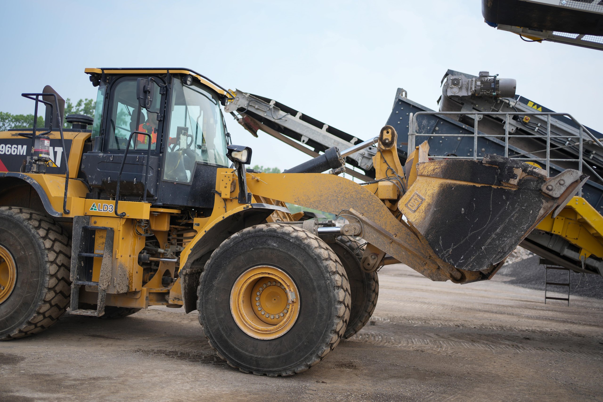 Photo of a loader machine, illustrating ER Media’s experience in serving construction and contractor businesses across Ontario.