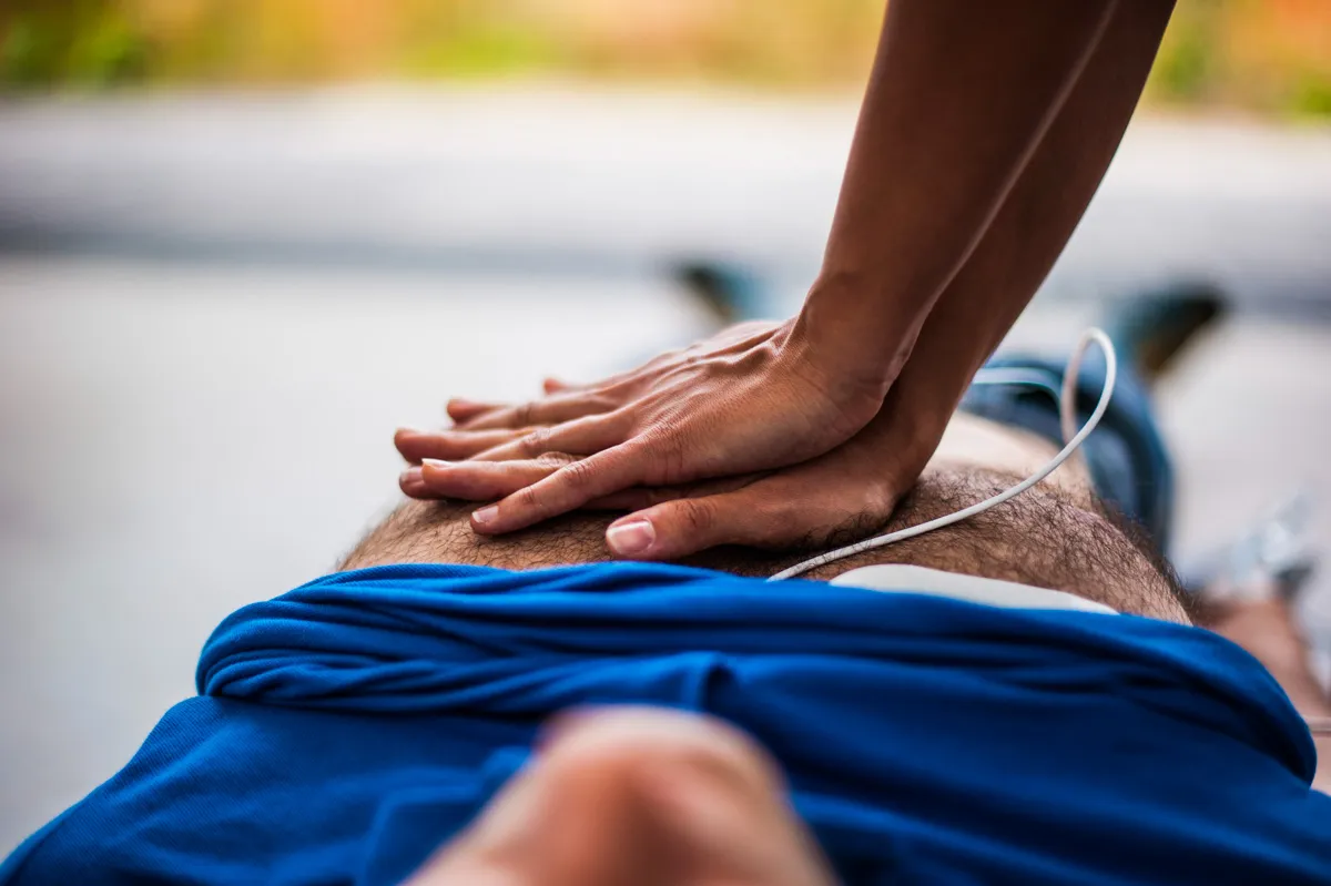 A doctor performing CPR
