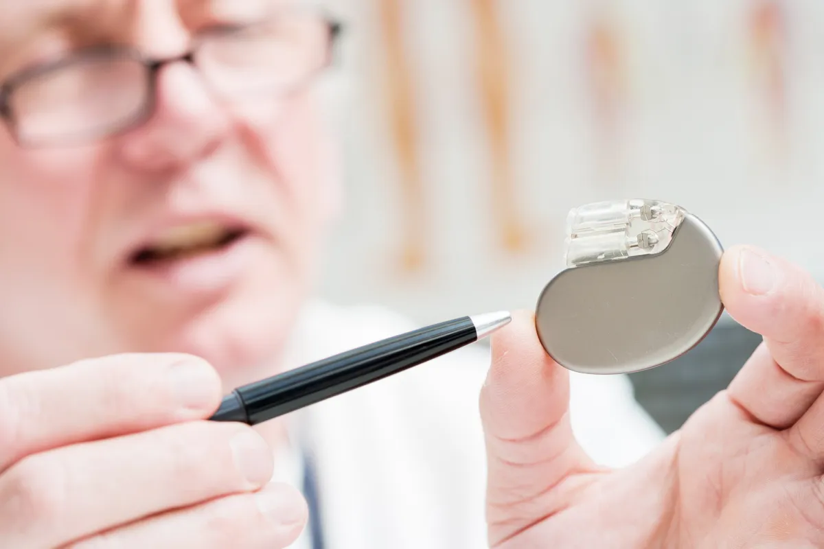 A doctor looking at a Pacemaker