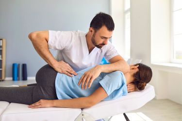 Woman with a chiropractor