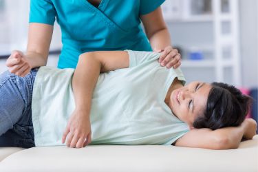 Chiropractor's patient smiling