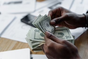 Person counting cash