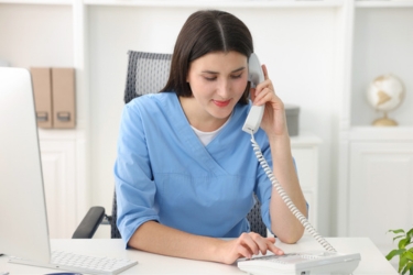 Office staff using the phone