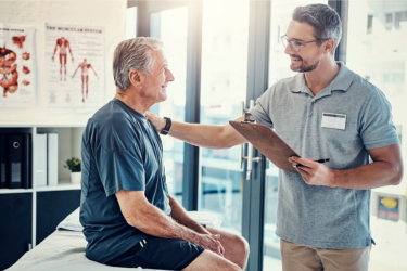 Chiropractor having empathy with his client