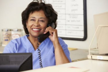 Happy medical front desk staff