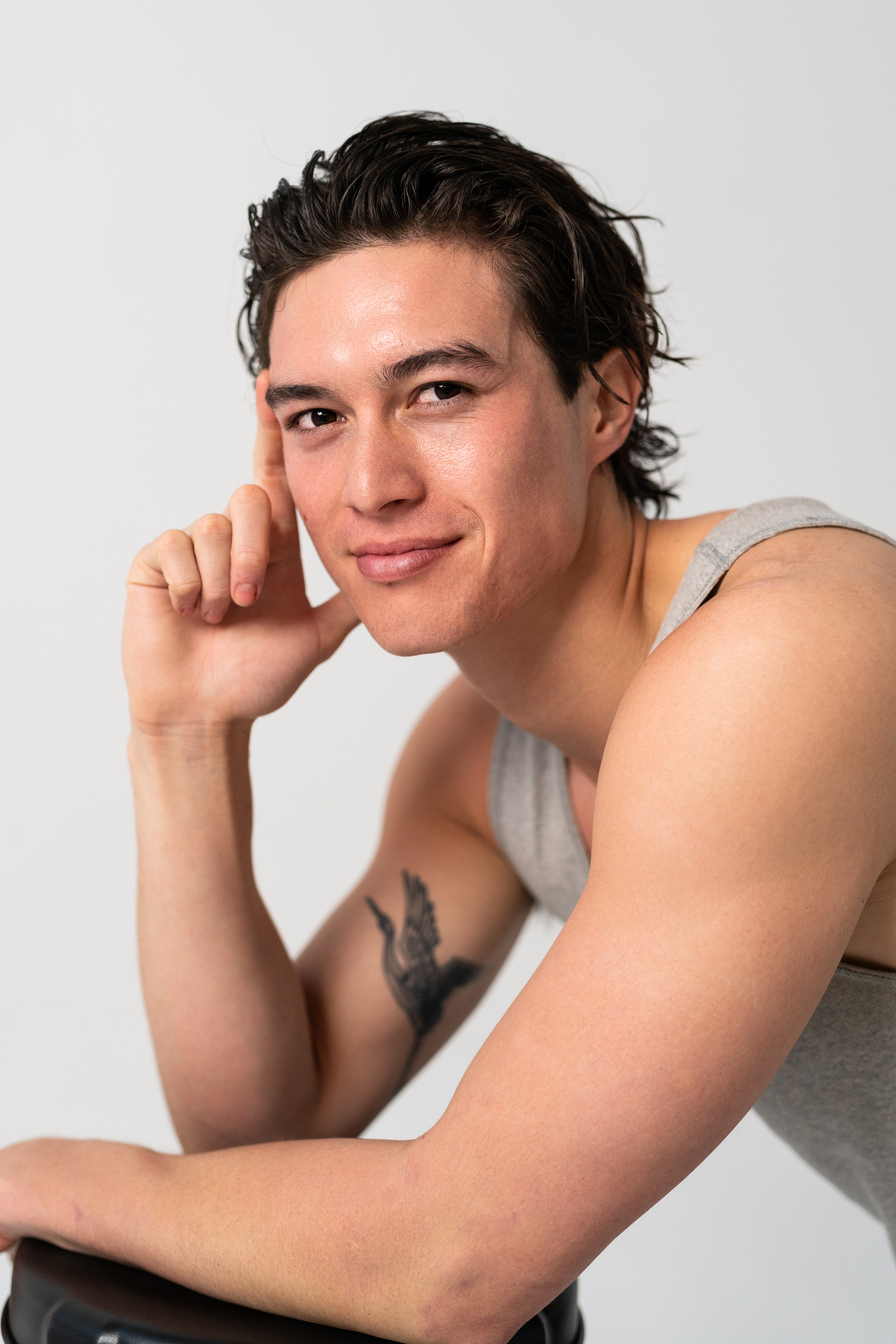 image of artist creating a tattoo