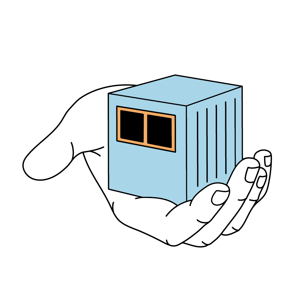 Eine Hand, die einen kleinen blauen Würfel mit zwei schwarzen Fenstern hält.