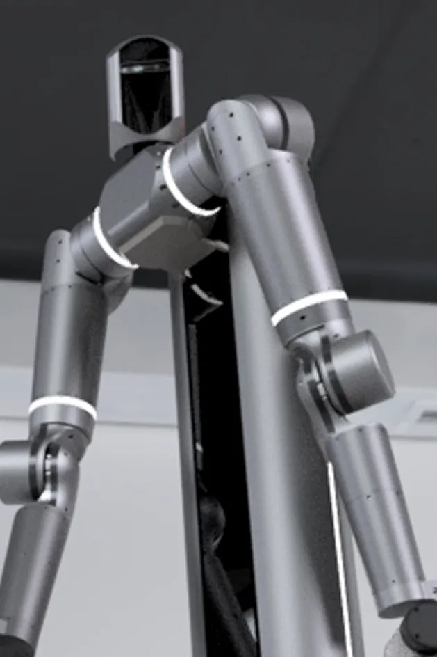 Black and gray humanoid robot with articulated arms and a reflective faceplate.