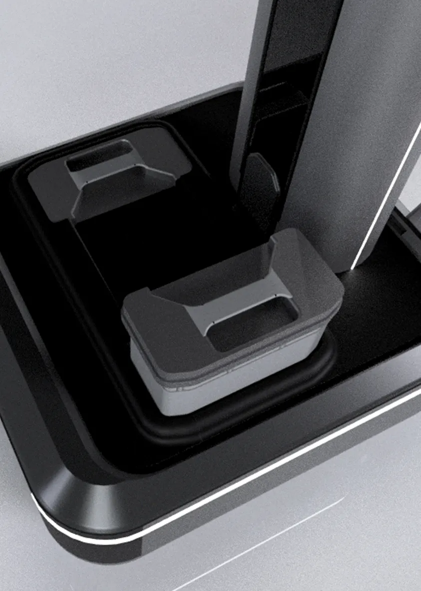 Close-up of a black and gray modern device with two rectangular components and a vertical structure connected on a glossy base.