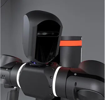 Close-up of a sleek black robot with a smooth, glossy head and cylindrical arms set against a gray background.