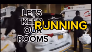 Participants running inside American Dream Mall during the Chesed 24/7 5K Run/Walk fundraising event.