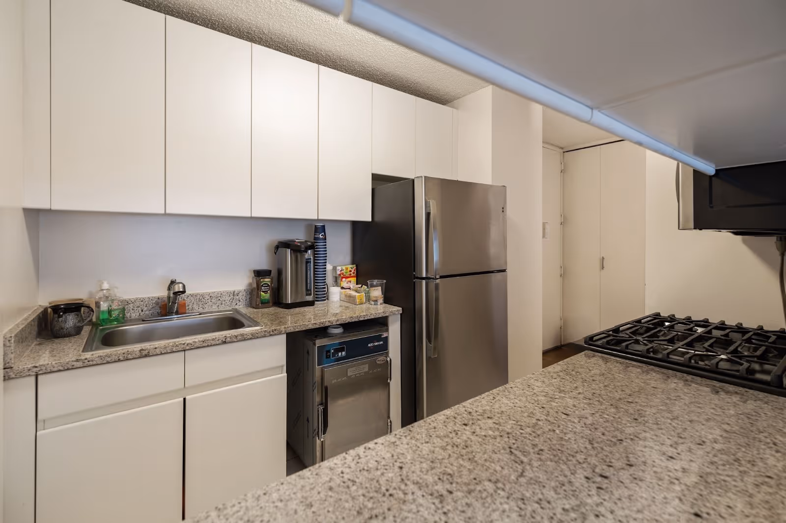 Spacious kitchen setup in chesed apartment