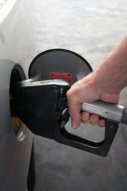 Why do some Gas Stations charge more for using a Credit Card? Bright