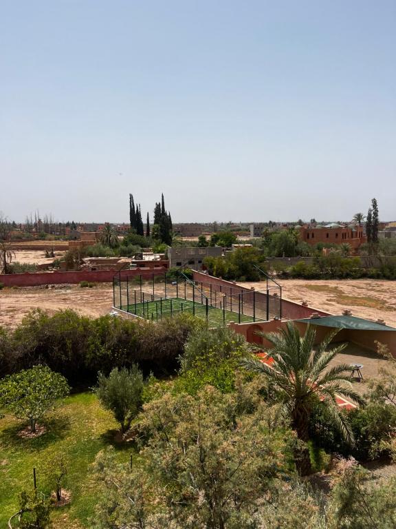 jenan-mayshad-marrakech,-boutique-hotel-with-pool-&-private-padel-court-morocco-1-padel-courts-marrakesh-hero.jpg