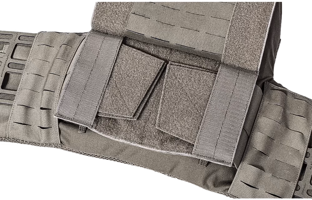 Close-up of a tactical belt with adjustable straps and hook-and-loop fasteners in gray fabric.