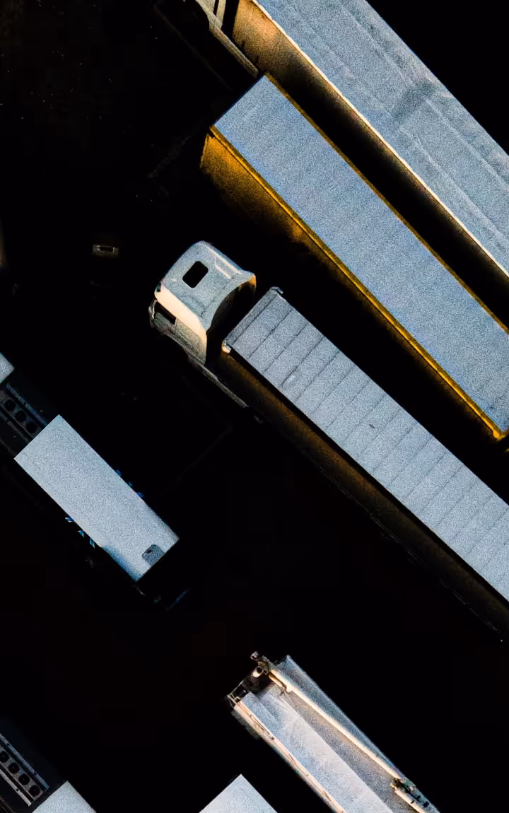 An arial view of semi-trucks in a parking lot