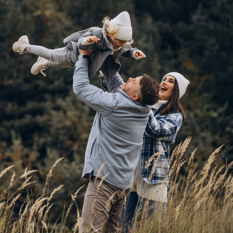 Family in the park. Clean Slate Clinic clients.