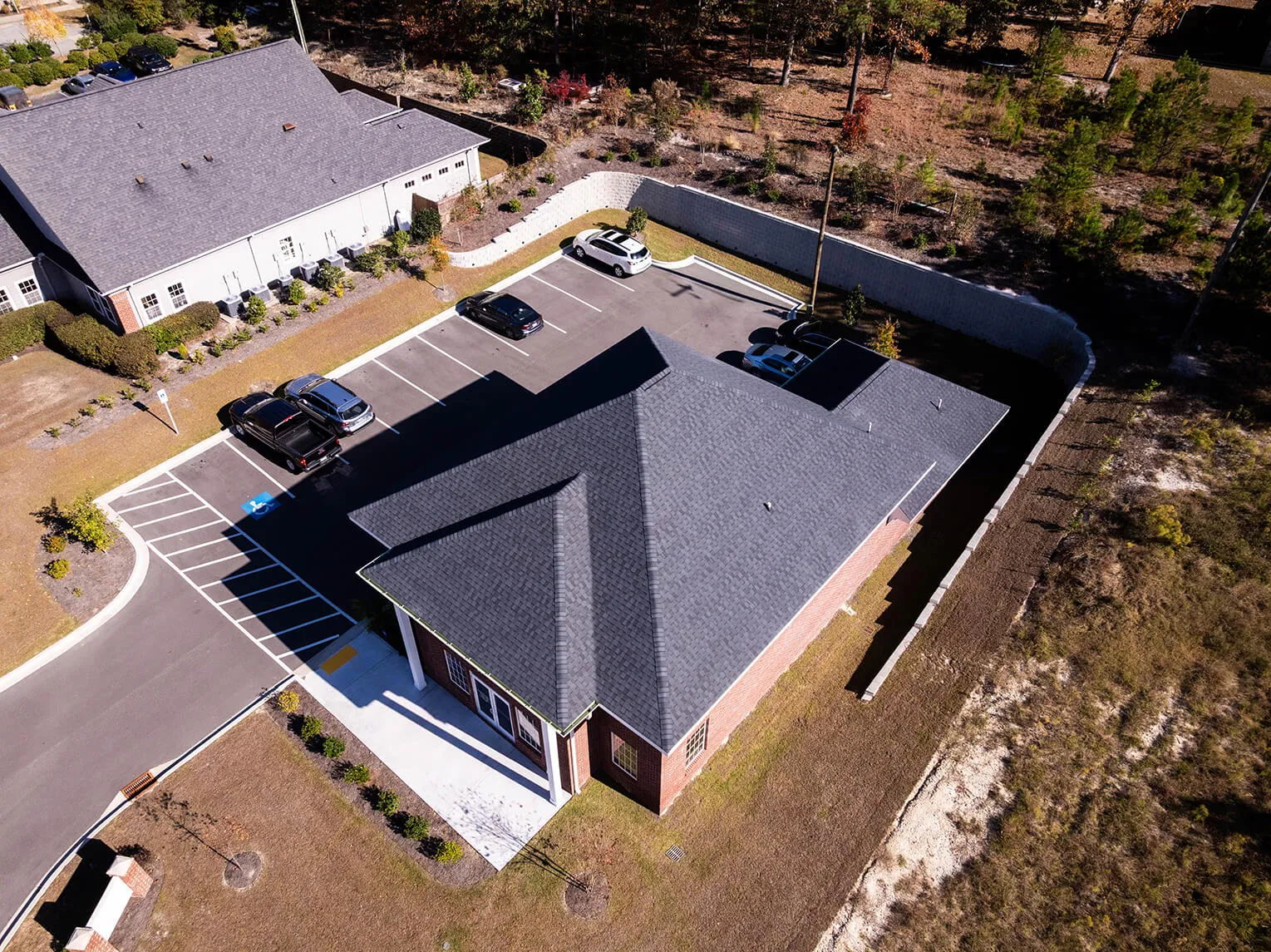 Optometry Facility Exterior With Brick Façade And Hardie Soffit.