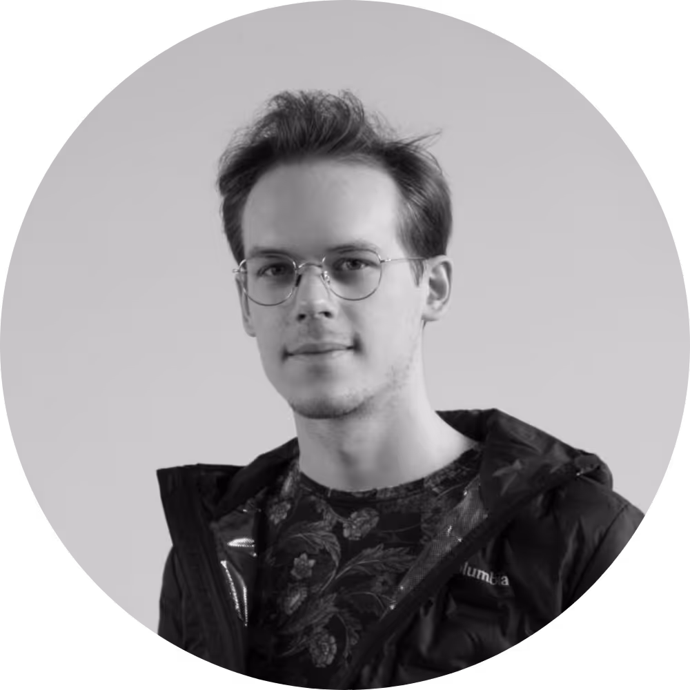 Close-up black and white portrait of Krzysztof Michalik.