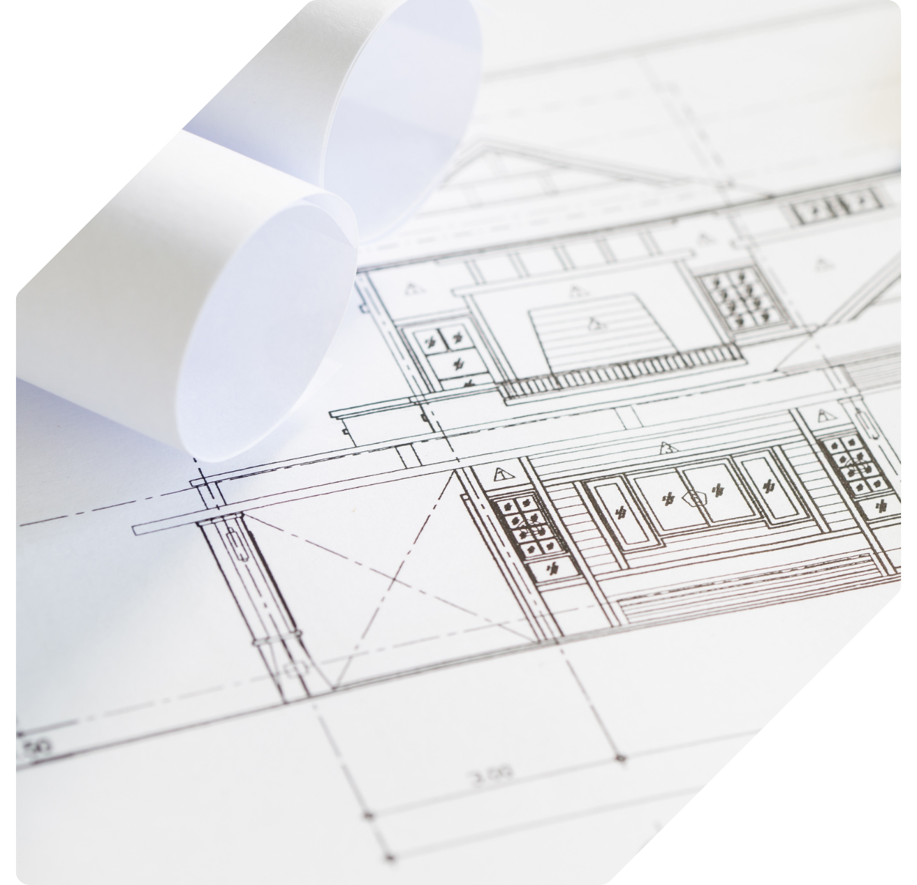 Rolled and flat architectural drawings showing a building elevation in fine line detail.