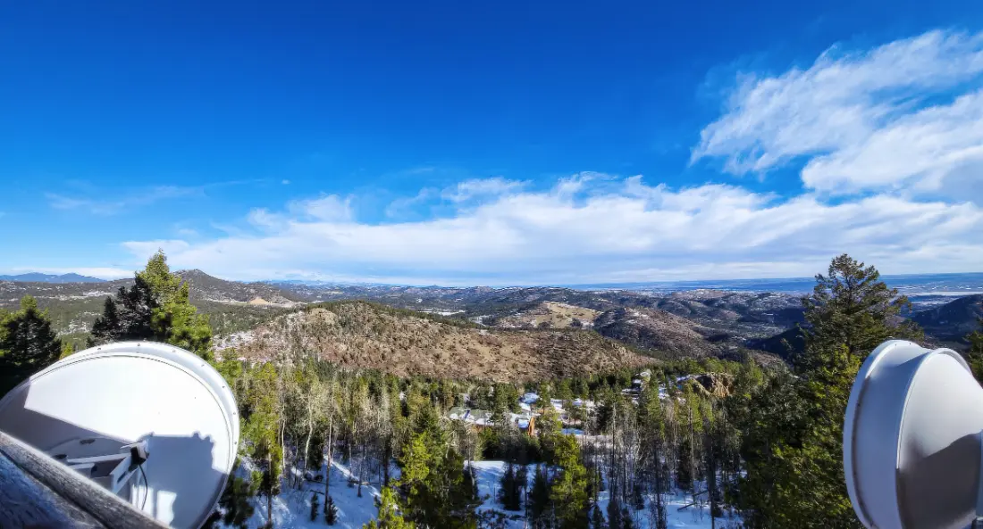 Satellite dishes on a ridge in winter