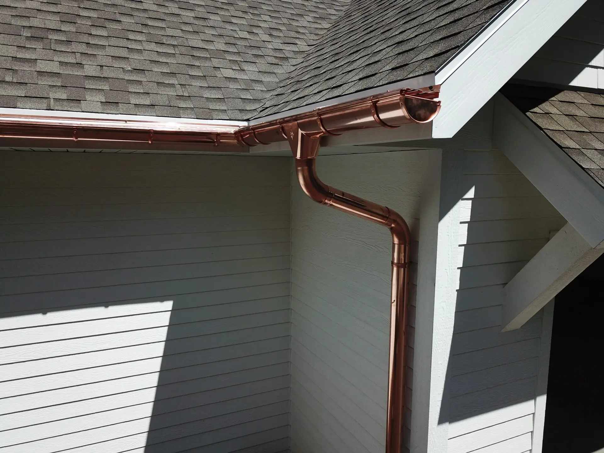 Seamless gutters installed along eaves