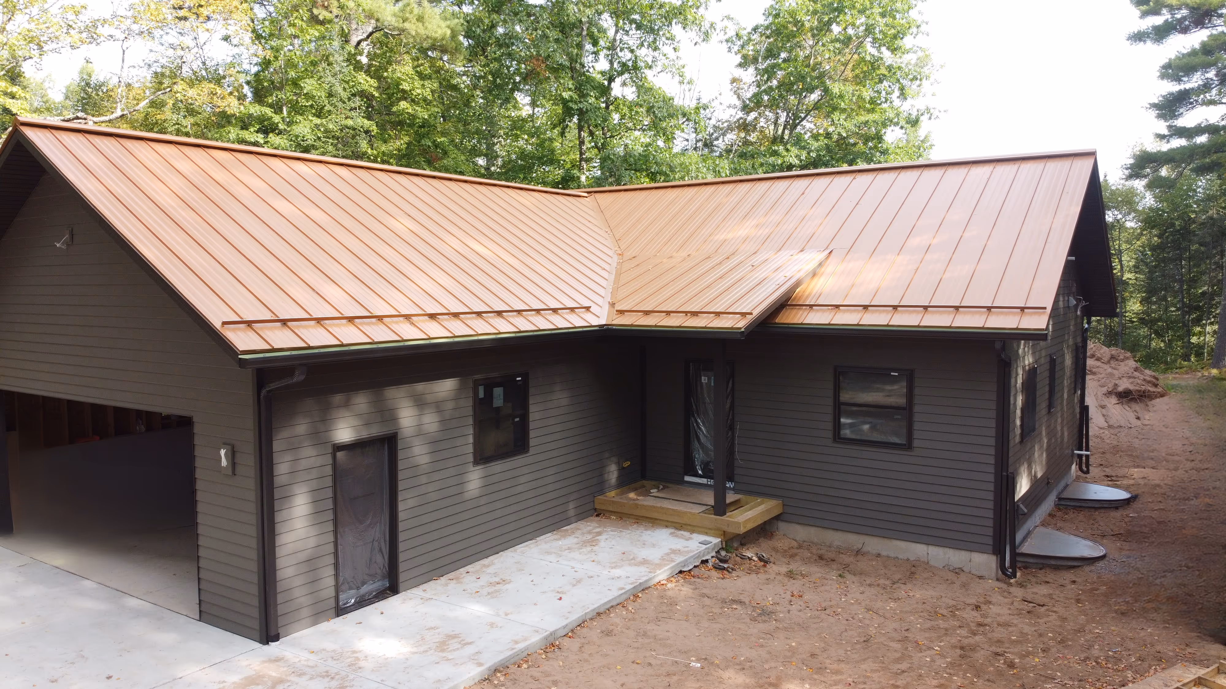 Northwoods home exterior with new roofing