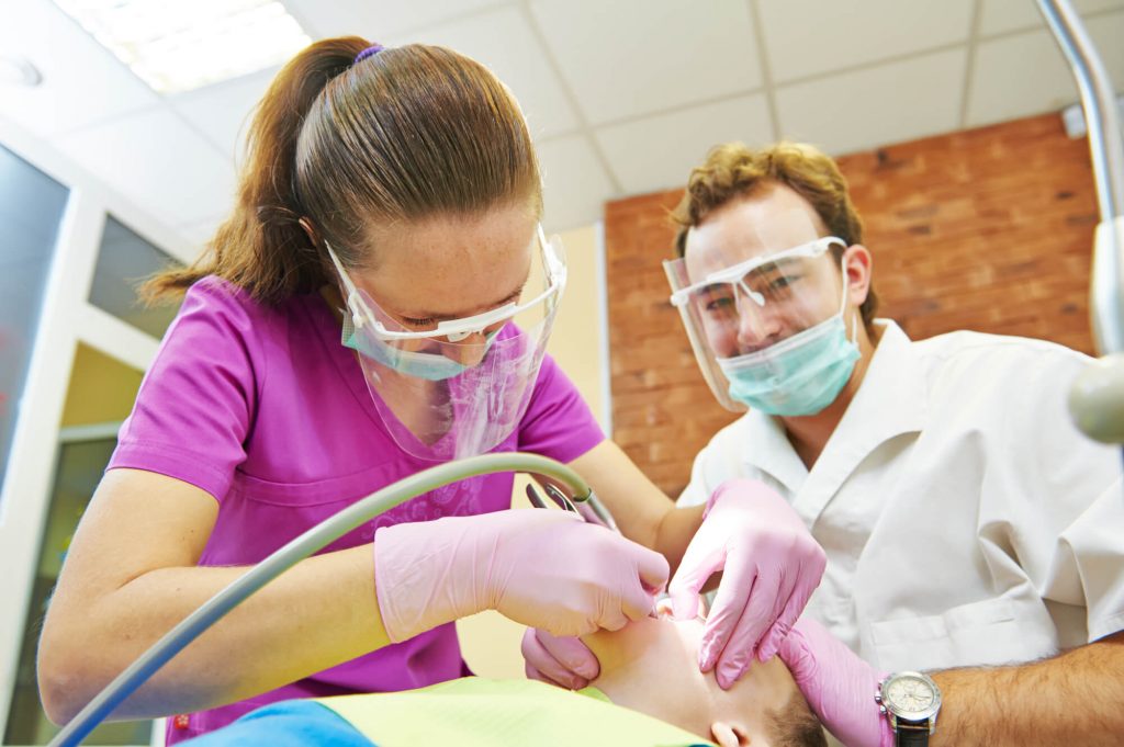 patient during dental crowns in plantation fl 
