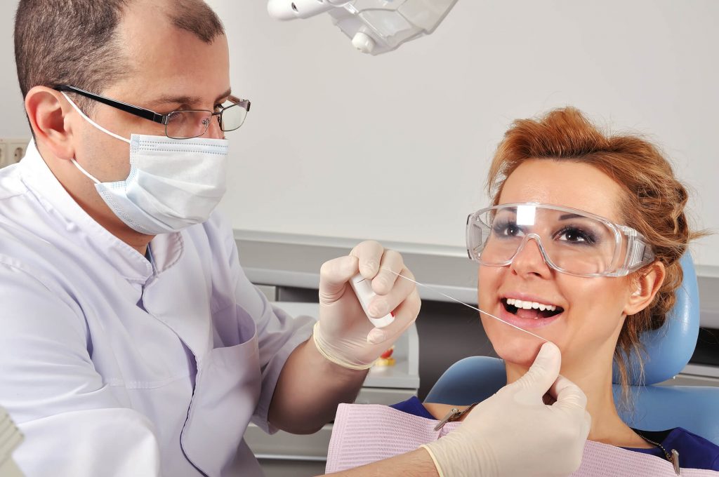 Patient with dentist at Plantation FL