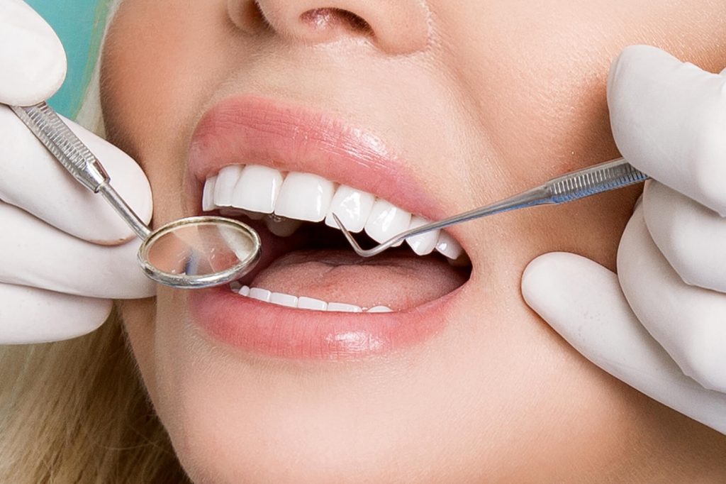 Woman during dental checkup family dentistry plantation fl