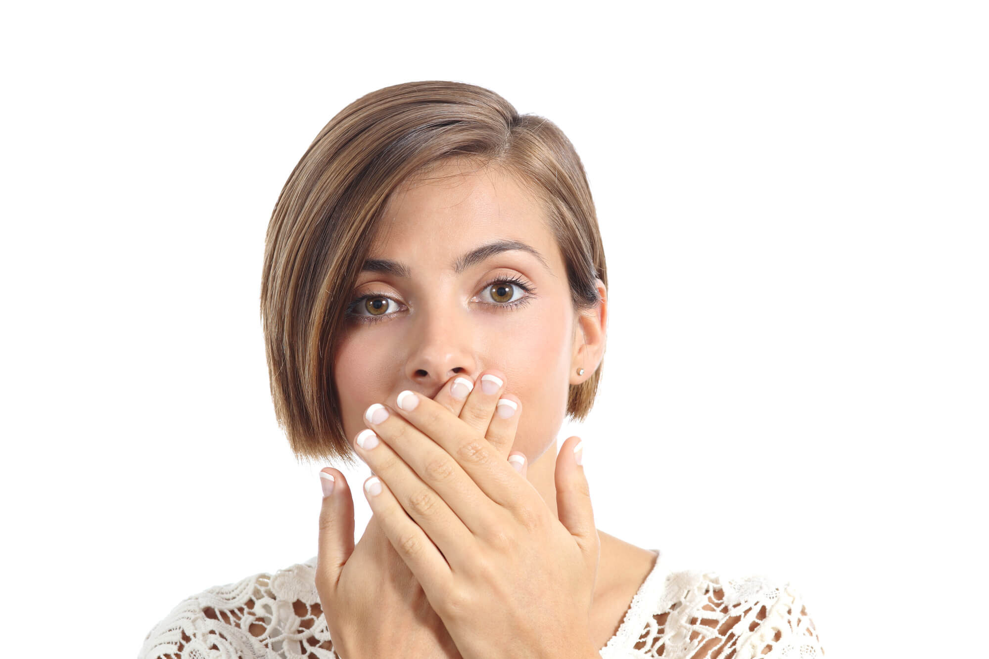 woman covers her mouth because of bad breath due to improper teeth cleaning in Fort Lauderdale, FL