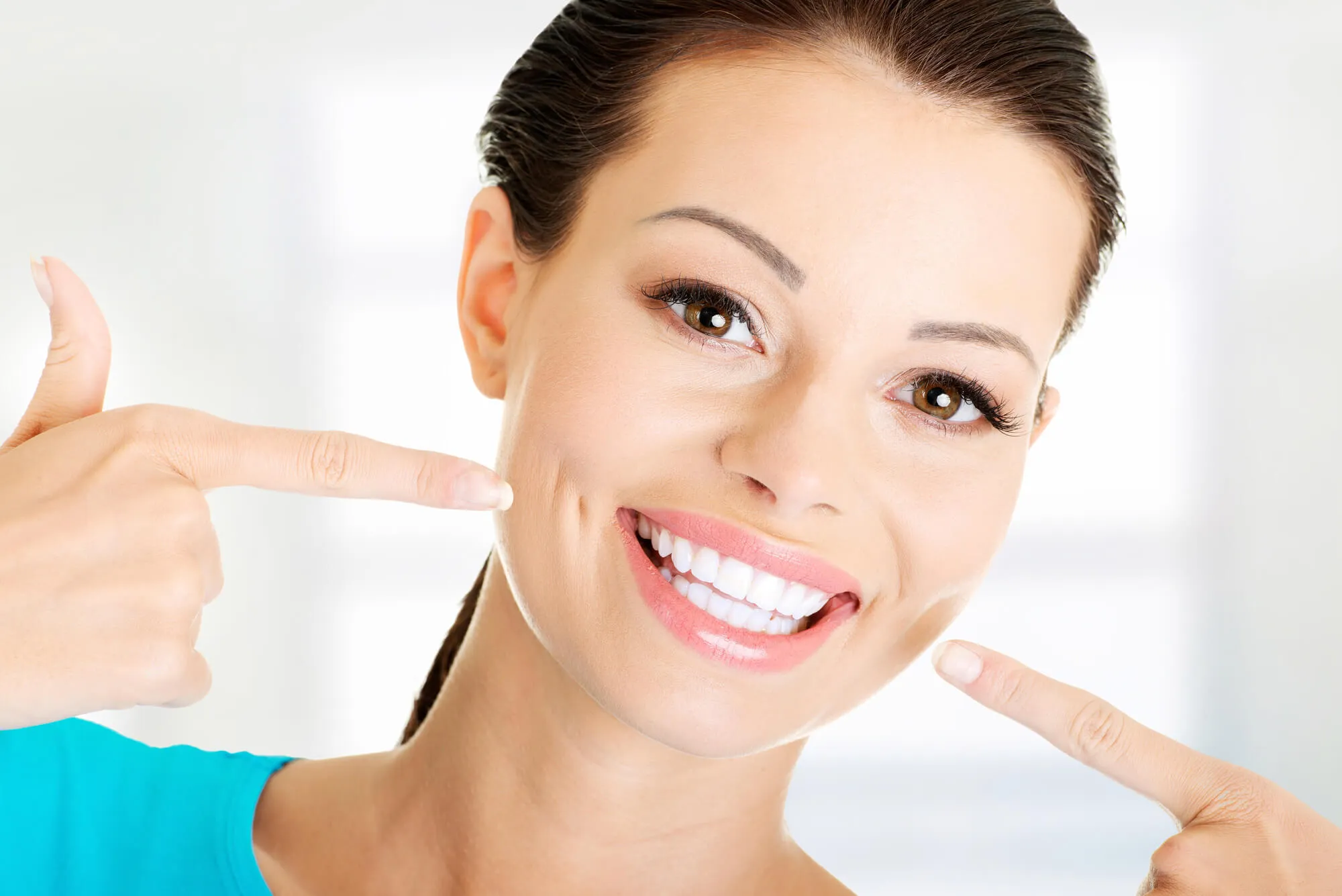 woman after getting teeth whitening in plantation fl