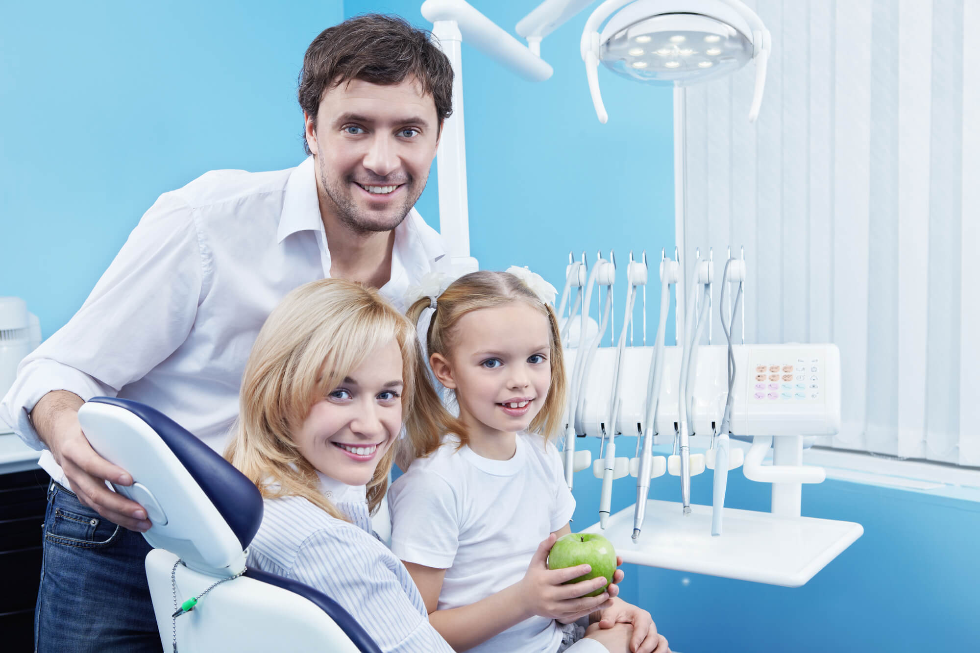 Happy family smiling after their  Family dentistry in plantation fl appointment.jpg