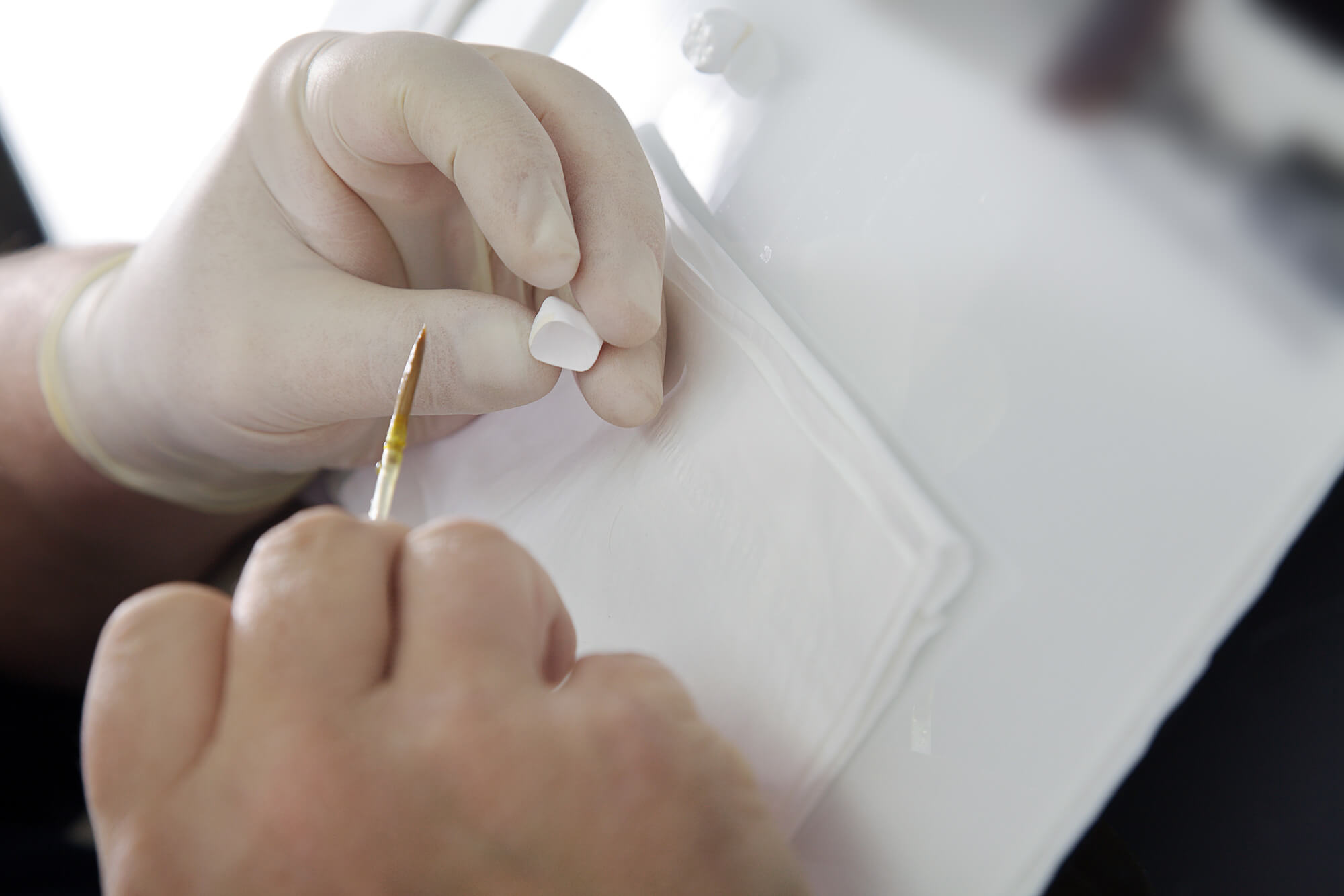 dentist working on Dental Crowns Davie, FL