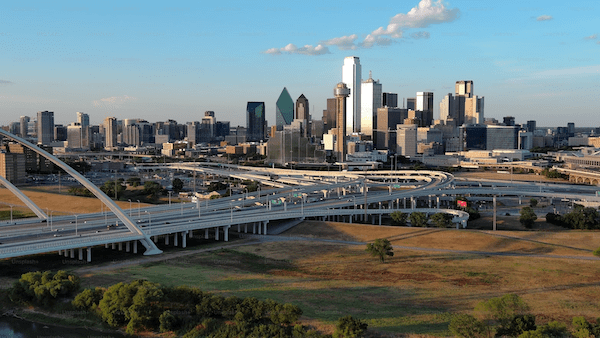 <subject>[background image] image of a busy downtown area (for a mobility and transportation)</subject>